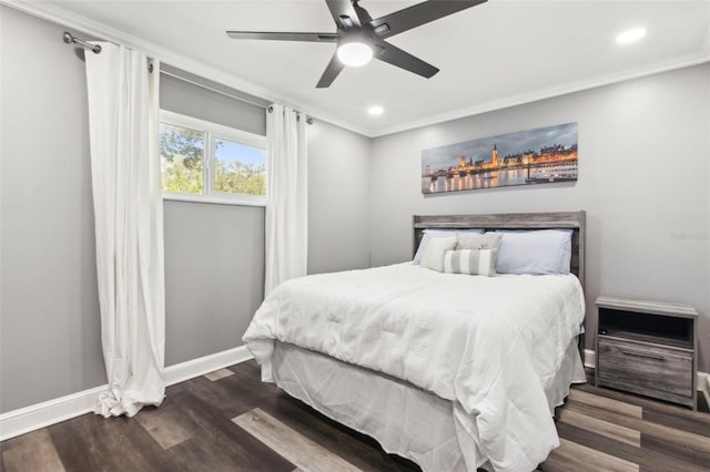 bedroom featuring recessed lighting, ornamental molding, ceiling fan, wood finished floors, and baseboards