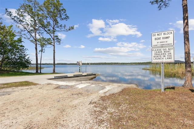 dock area featuring a water view