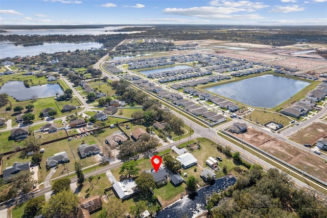 aerial view featuring a water view