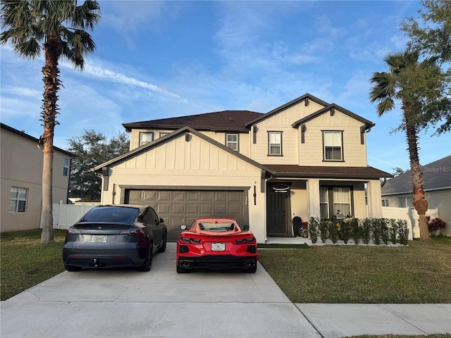 view of front facade featuring a garage and a front lawn