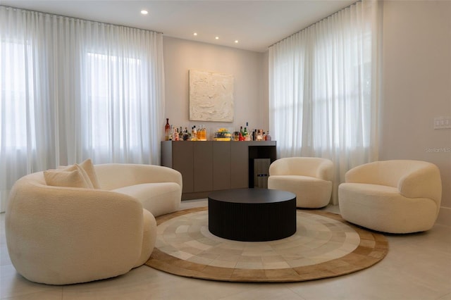 526 First Cape Coral Dr, Winter Garden, FL 34787 - sitting room with tile patterned flooring and bar area