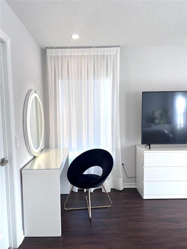 526 First Cape Coral Dr, Winter Garden, FL 34787 - sitting room featuring dark wood-type flooring and a textured ceiling
