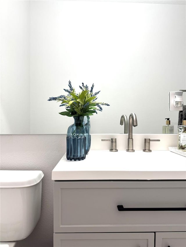 526 First Cape Coral Dr, Winter Garden, FL 34787 - bathroom featuring vanity and toilet