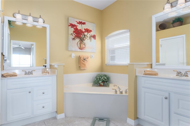 bathroom with vanity, a bath, and tile patterned floors