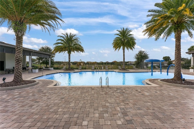 view of swimming pool featuring a patio