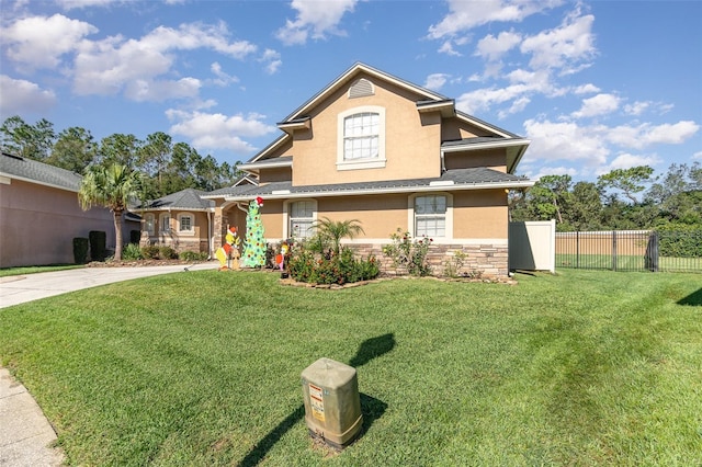 view of front of home with a front yard