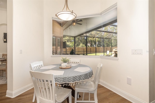 dining space featuring hardwood / wood-style flooring