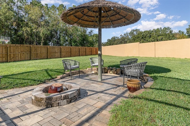 view of patio with an outdoor fire pit