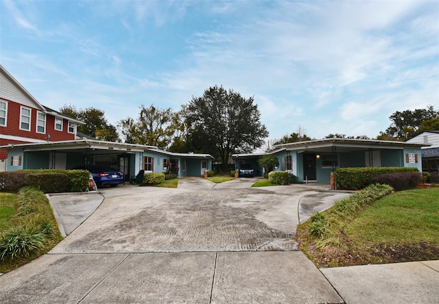 view of front of house featuring a carport