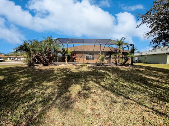 view of yard featuring a lanai