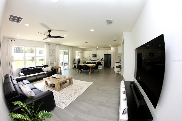 living room with ceiling fan