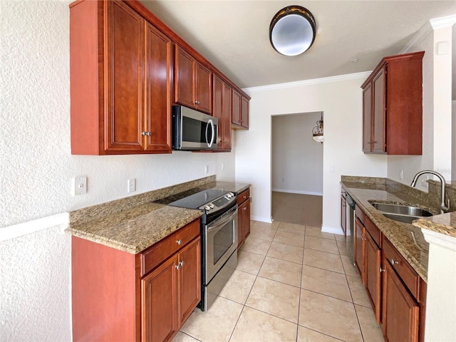 kitchen featuring sink, ornamental molding, stone counters, and appliances with stainless steel finishes