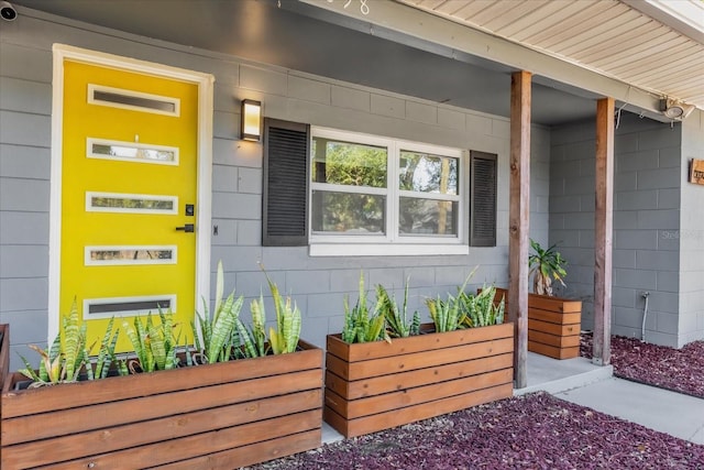 entrance to property with a porch