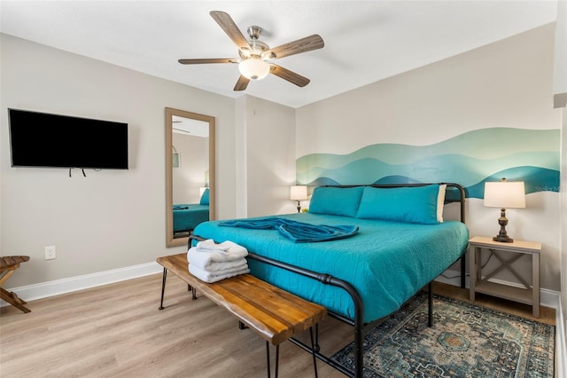 bedroom featuring ceiling fan and light hardwood / wood-style floors