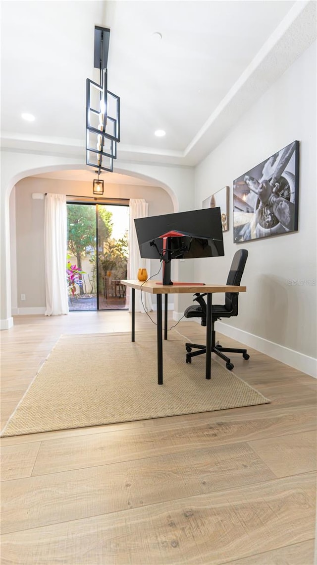 office with hardwood / wood-style flooring