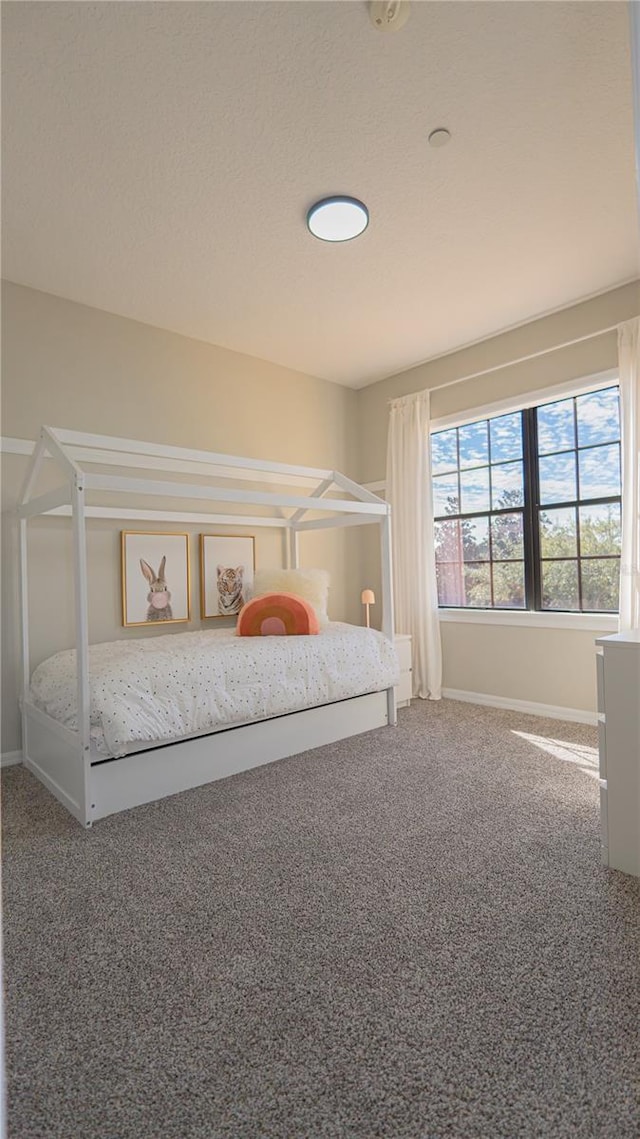 unfurnished bedroom with carpet flooring