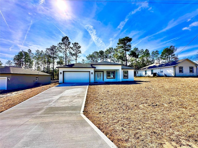 ranch-style home with a garage