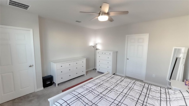 unfurnished bedroom with ceiling fan and light carpet