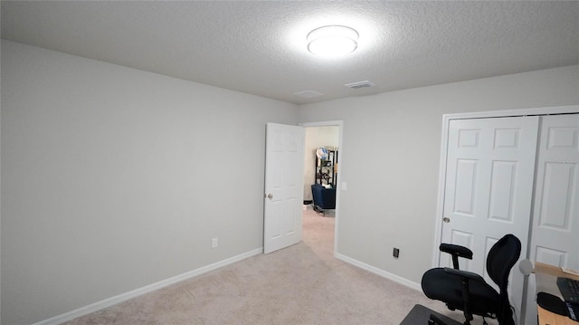 interior space with a textured ceiling