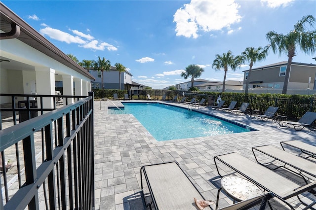 view of pool featuring a patio