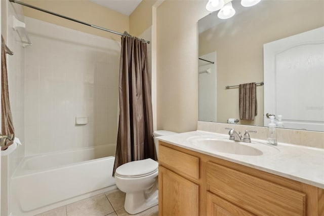 full bathroom featuring shower / bath combination with curtain, tile patterned floors, toilet, and vanity