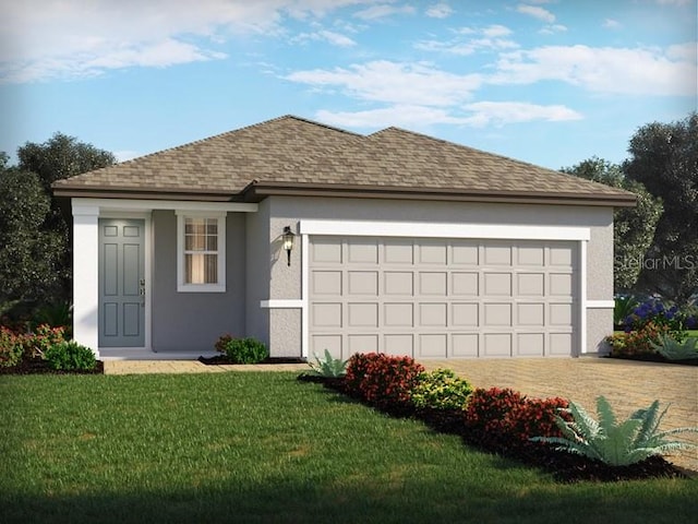 view of front of home with a garage and a front yard