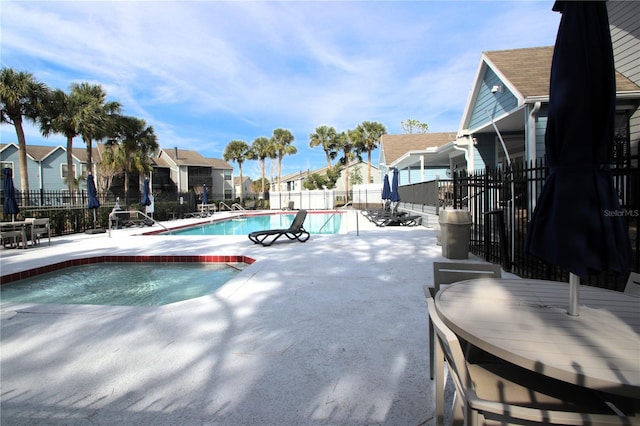 view of pool featuring a patio