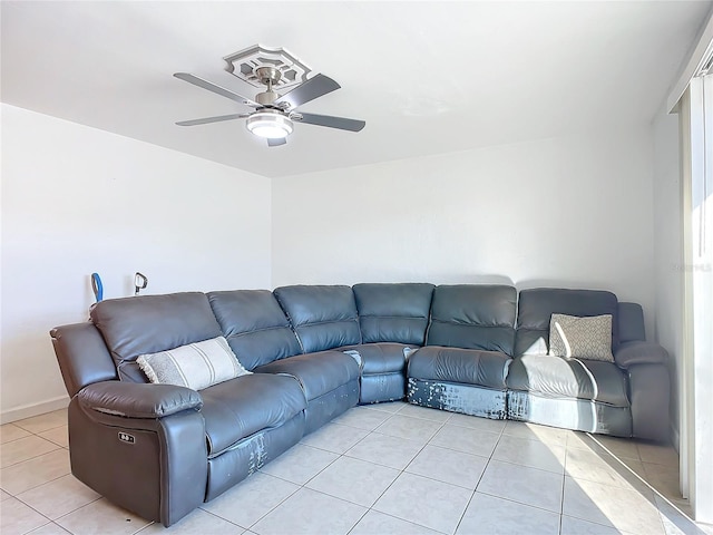 living room featuring light tile patterned floors and ceiling fan