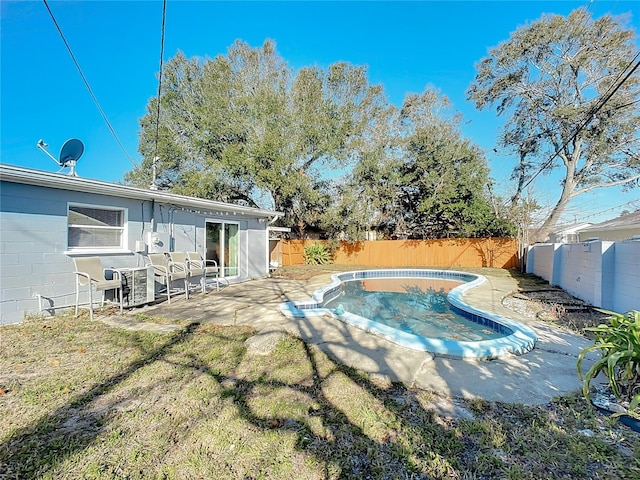 view of pool featuring a patio