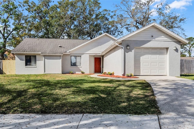 ranch-style home with a garage and a front yard