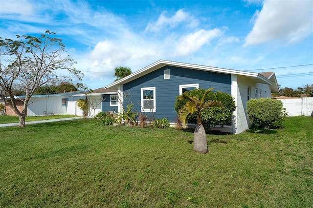 view of front of property with a front lawn