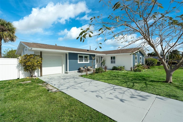 ranch-style home with a garage and a front lawn