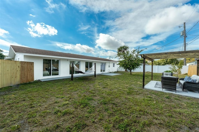 view of yard featuring an outdoor living space and a patio