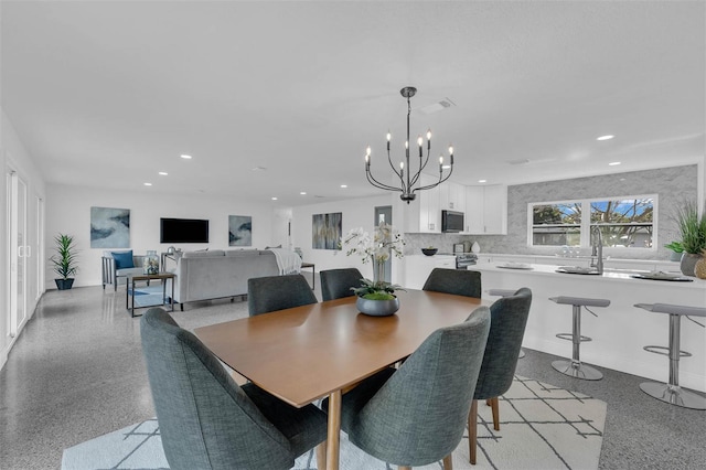 dining area with a chandelier