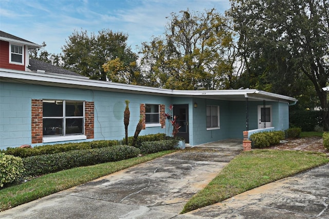 view of front of home with a carport