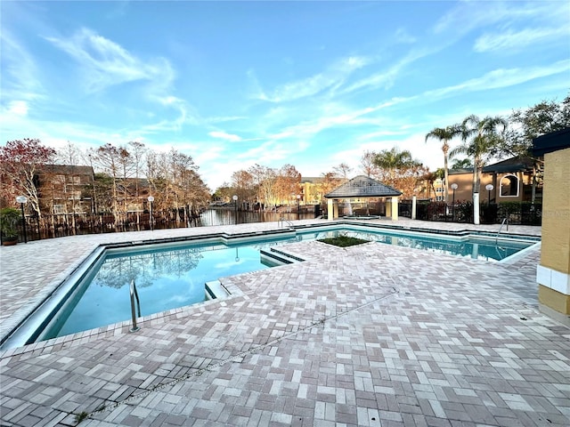 view of swimming pool featuring a gazebo