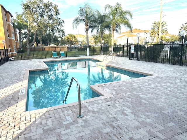 view of swimming pool featuring a patio