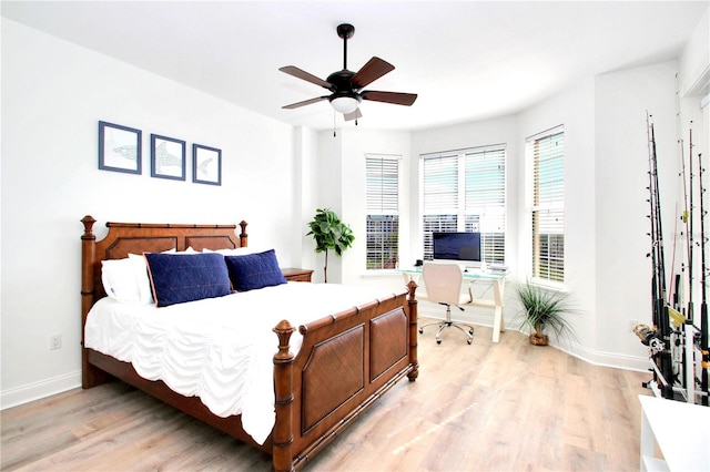 bedroom featuring light hardwood / wood-style flooring and ceiling fan