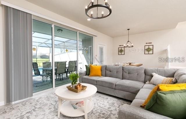 living room with a notable chandelier