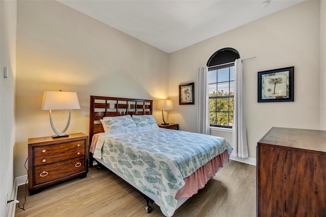 bedroom with light hardwood / wood-style flooring