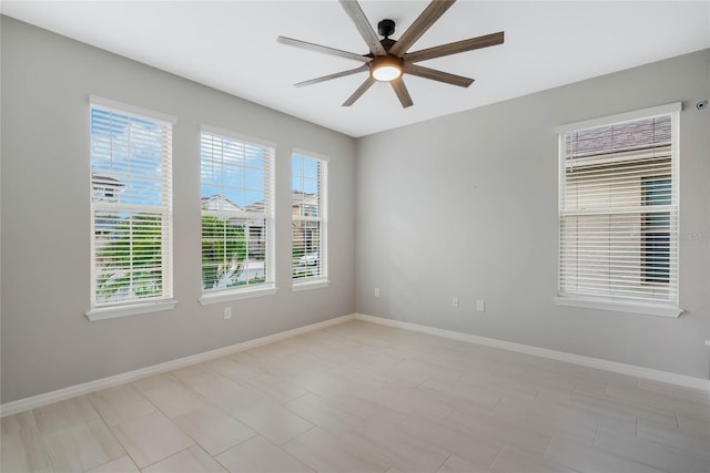 spare room featuring ceiling fan