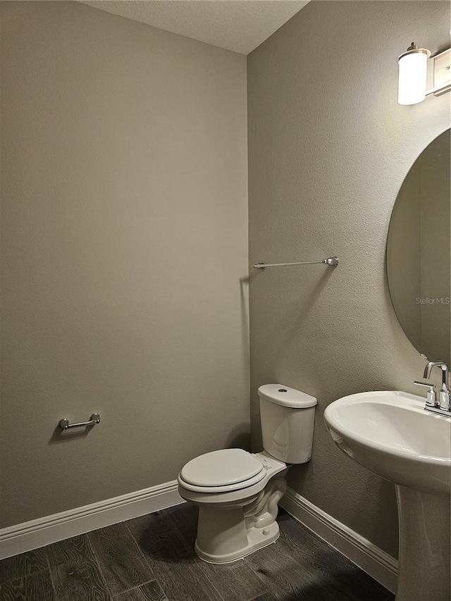 bathroom featuring toilet