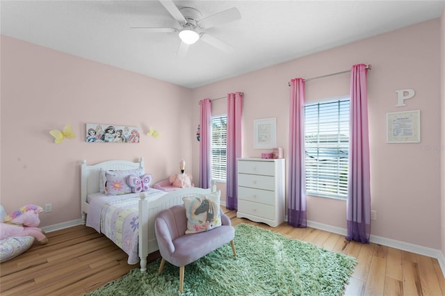 bedroom featuring ceiling fan and light wood-type flooring