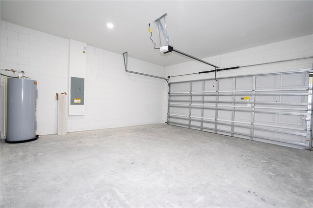 garage featuring a garage door opener, electric panel, and water heater