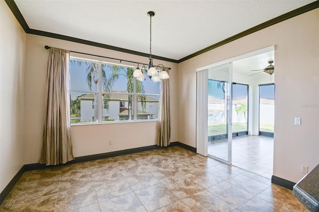 unfurnished dining area with ceiling fan with notable chandelier and ornamental molding