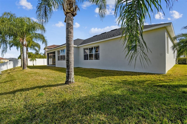 view of home's exterior featuring a lawn