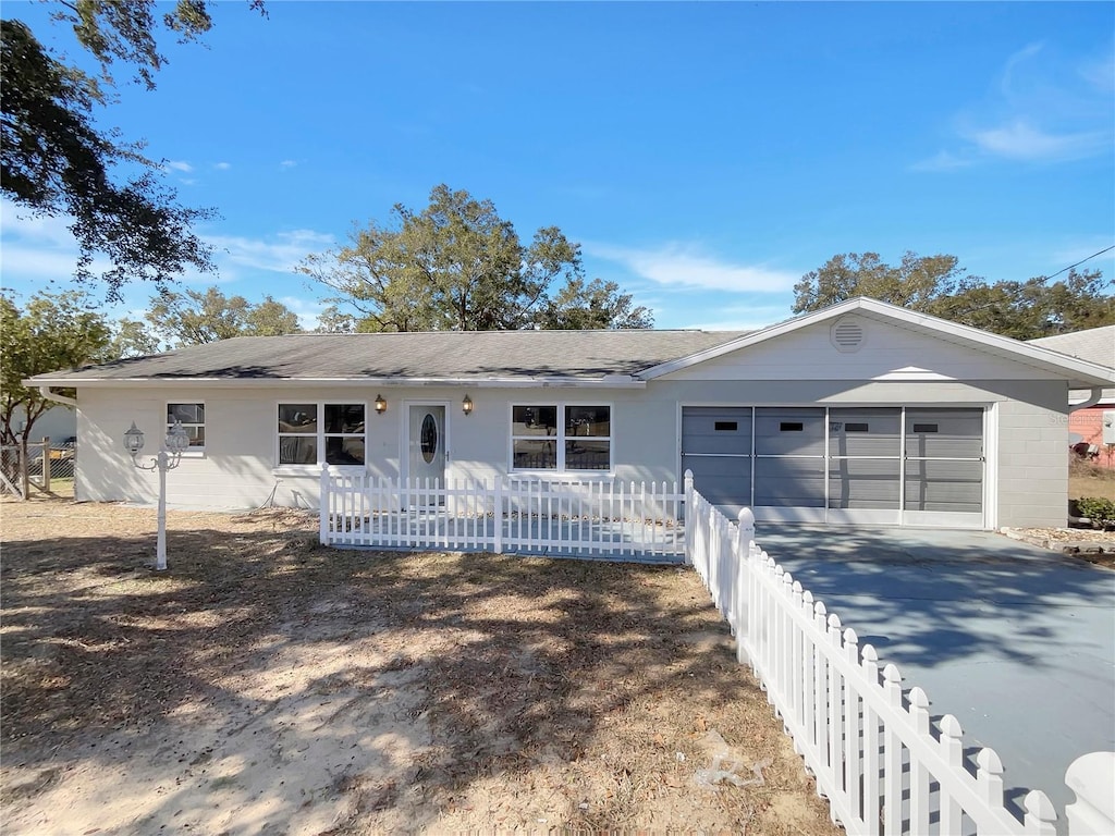 single story home with a garage