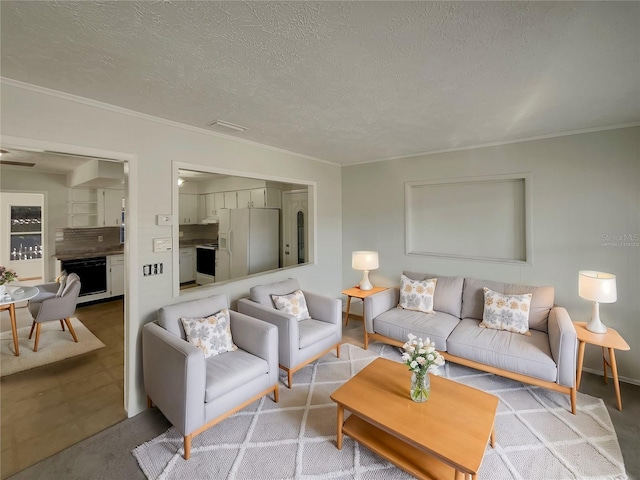 living room with crown molding and a textured ceiling