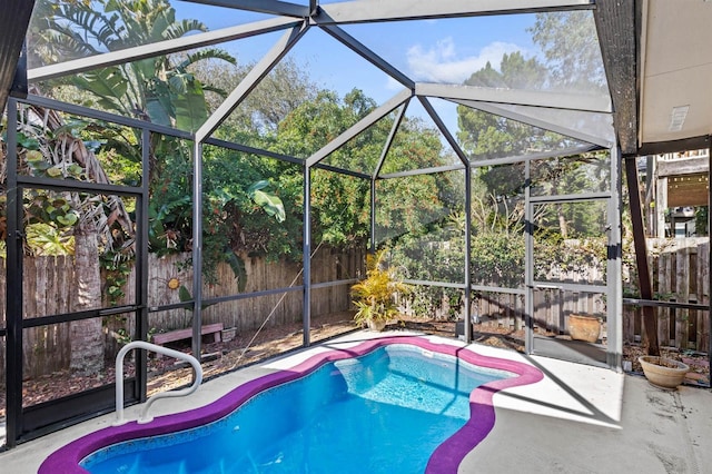 view of pool featuring a lanai