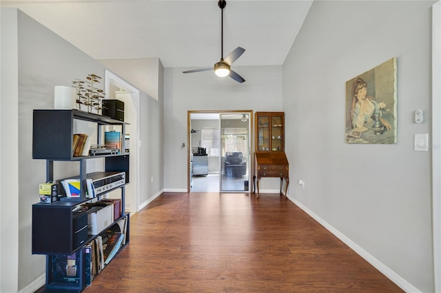 miscellaneous room featuring high vaulted ceiling, hardwood / wood-style floors, and ceiling fan